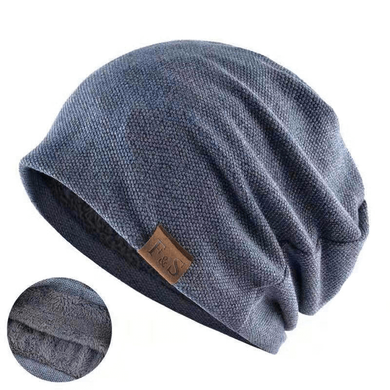 Fashion warm soft knitting beanie with fur for outdoor sports, unisex blue hat with letter pattern and cozy interior.